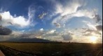 Rainbow over a cloud-shrouded mount Kilimanjaro