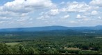 Looking east over the Appalacian hills from the Sideling Hill interpretive center, in Maryland, with Pennsylvania a few miles north (left in picture) and West Virginia a few miles south (to the right).