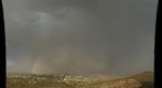 Rainbow, Dust Storm and Monsoon Rain over Tucson