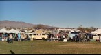 Buses by the Bridge at Lake Havasu State Park looking east very late afternoon