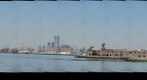 statue of liberty and downtown manattan   from red hook - brooklyn