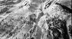 Backcountry skiers track up Mt Daly, Snowmass, Colorado (Black and White)