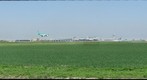 Airplanes touching down at Schiphol airport