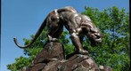 bronze panther on bridge pier looking over Panther Hollow, Pittsburgh