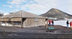 Discovery Hut and the pano photographer