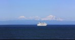 Snow mountain and cruise ship