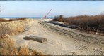 Crane on beach for dredging project, Gunnison Beach, Sandy Hook, NJ, USA
