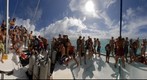 Lots of Odyssey Expeditions students on front of Moorings catamaran in the Tobogo Keys, Grenadines