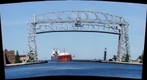 Duluth Minnesota Aerial Lift Bridge with Ore Boat Arrival
