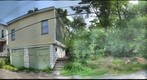 Fletcher Way between North Murtland Street and North Lang Avenue from Vacant Lot (across the street from 7013 Fletcher)