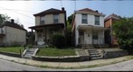 Fletcher Way between North Murtland Street and North Lang Avenue from vacant lot across the street from address point 7040 Fletcher