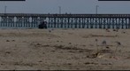 100621 east side Goleta Pier fishing from beach summer solstice flower circle 