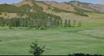 View of a small river valley of Khangay