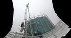 Brian climbs the radio tower