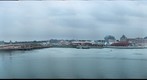 Singapore City Scenes - Evening View of Sentosa's Resorts World and Universal Studios from HarbourFront