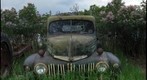 OLD TRUCK IN THE GRASS