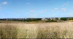 View of Kirovo-Chepetsk from hill with grass
