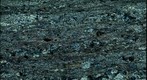 Thin Section Photograph of Schist from Mount Greylock, Massachusetts. Graphite only present as inclusions in plagioclase.