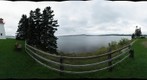 Lighthouse at Battery Provincial Park Overlooking St. Peter's Bay, Nova Scotia, Canada by Trey Smith