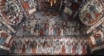The painted nave of the wooden church of Dretea , Cluj County , now relocated in the open air Village Museum at Dumbrava Sibiului, Romania (eastern wall)