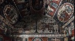 The painted nave of the wooden church of Dretea , Cluj County , now relocated in the open air Village Museum at Dumbrava Sibiului, Romania (western wall)