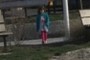 Little girl heading for the water.