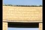 Gold text on Monument