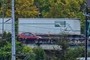 little red car and semi