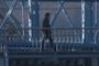 Pedestrian on the Roebling Suspension Bridge