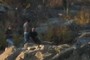 people on them there rocks