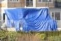 The Ubiquitious Blue Tarp