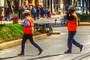 Workmen in orange