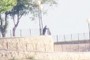 Hombre en la punta del Cerro
