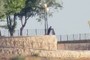 Hombre en la punta del Cerro
