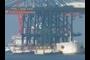 A ship loaded with cranes