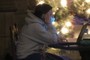 Cell phoner computes by Christmas Tree light