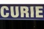 Curie division sign