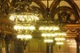 3 chandeliers and a reflection