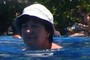 Woman with a hat thinks...