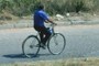 Man on Bicycle edge of frame right