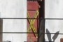 Caution tape on door.
