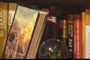 Book by Latin American Writer Isabeal Allende and snow globe