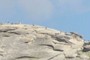Hikers approaching the cables of Half Dome