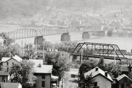 The old Monongahela Bridge and the Pennsylvania Railroad bridge