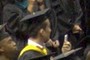 Hey! No texting while graduating! :)