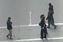 crossing the street with coffee