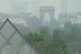 The Arch of Triumph and the Louvre Pyramid peak