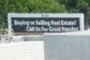 notice a real estate sign