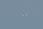 Another airplane in the distance