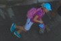 A girl in pink and blue.